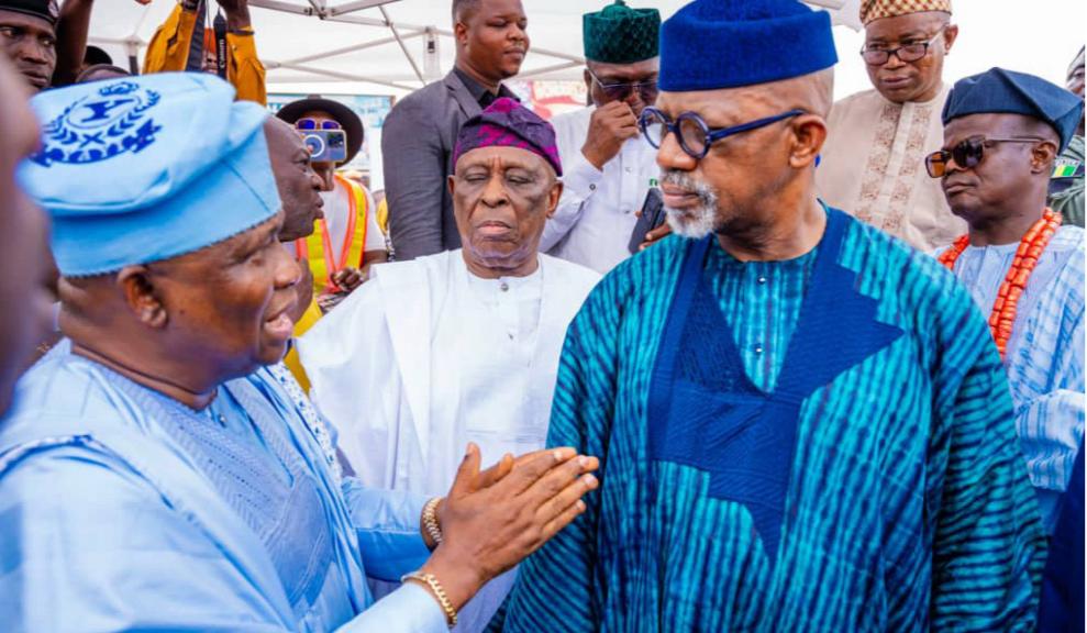Senator Adeola explaining a point to Prince Dapo Abiodun, Governor of Ogun State, while Aremo Olusegun Osoba and Oba Kehinde Olugbenle watches.