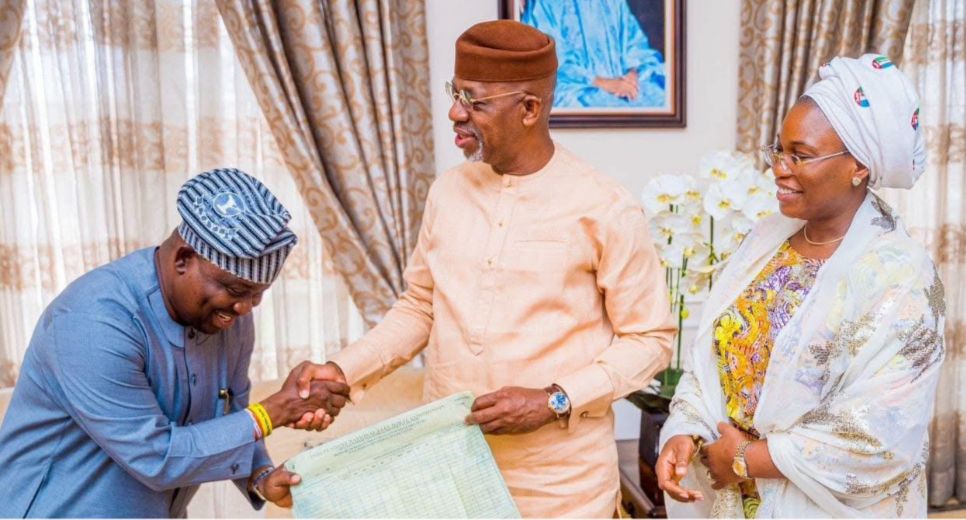 Senator Adeola presenting his winning results and being congratulated by Prince Dapo Abiodun, Governor of Ogun State, following the 2023 National Assembly election for Ogun West, while Mrs. Temitope Adeola looks on
