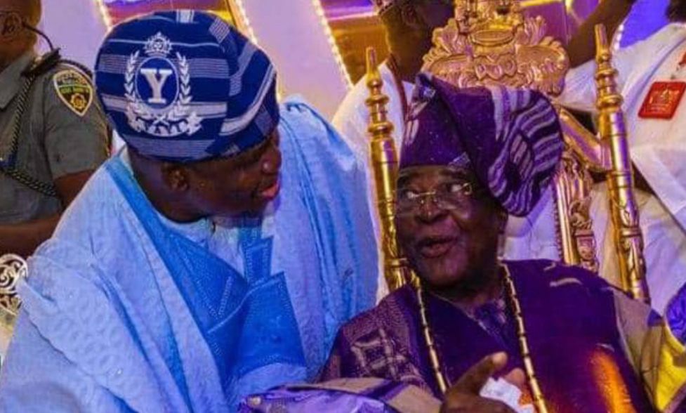 Senator Adeola conferring with His Royal Majesty, the late Awujale of Ijebu Land, Oba Sikiru Kayode Adetona, GCON, at a public event.